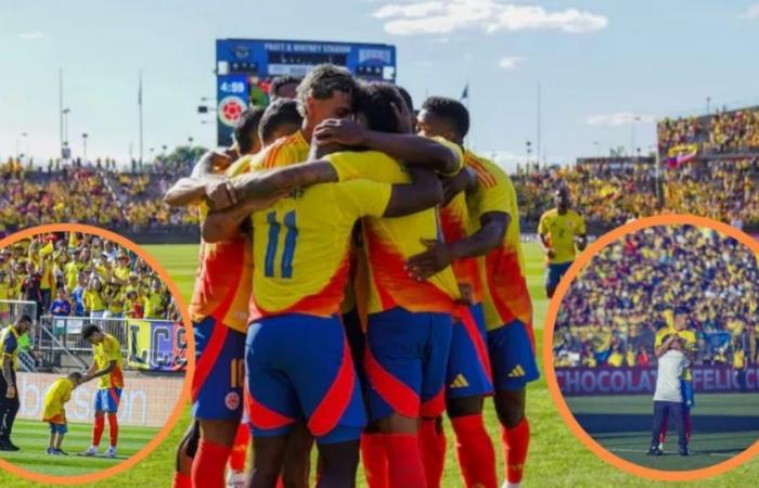 Kinder brachen in das Freundschaftsspiel zwischen Kolumbien vs. Bolivien bewegt die Spieler und Zuschauer